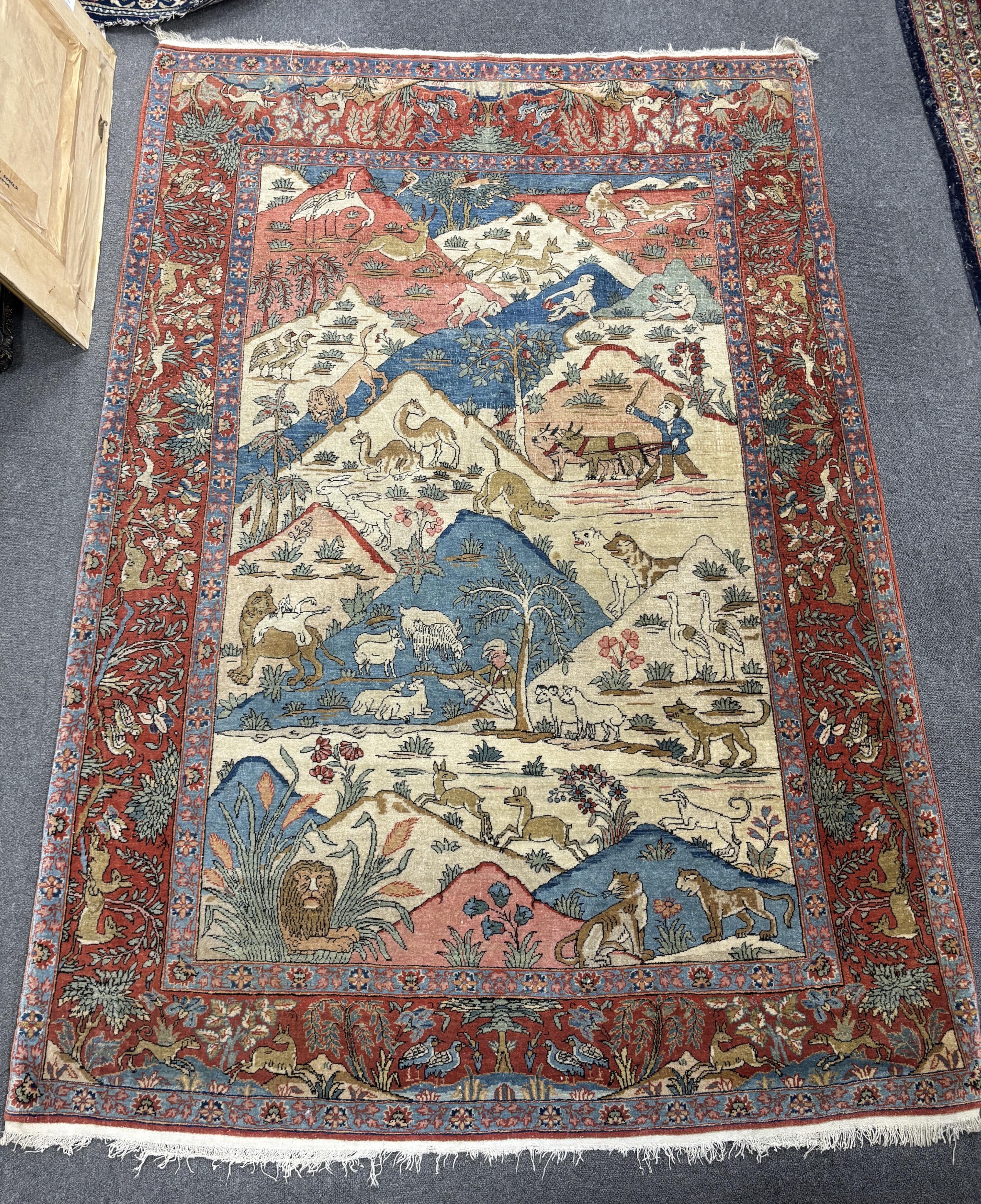 An early 20th century Tabriz pictorial rug, 194 x 136cm